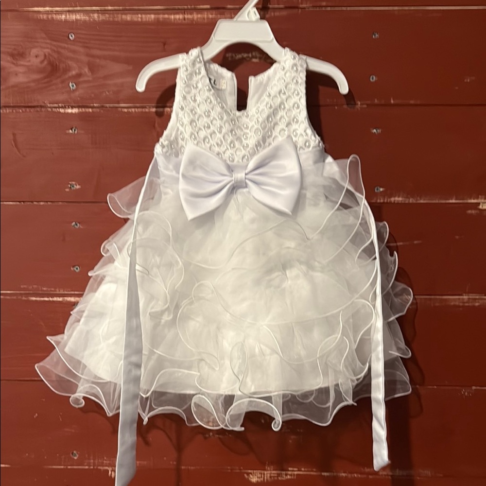 Elegant White Ruffled Dress with Bow